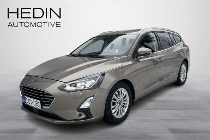 Ford FOCUS 1,0 EcoBoost 125hv A8 Titanium Wagon / Vetokoukku/ HUD/ ACC/ Tutkat/ Navi/ Hieno - LOT-135