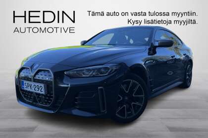 BMW i4 M50 Charged // Adaptive Cruise / Laserlight / Vetokoukku / Black Sapphire-ulkoväri // - SPK-292